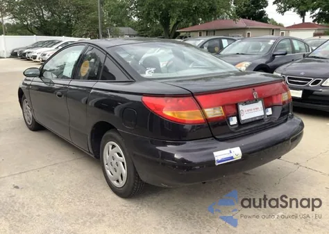1999 Saturn Sc1 z USA, uszkodzony, nr VIN 1G8ZP1283XZ324457